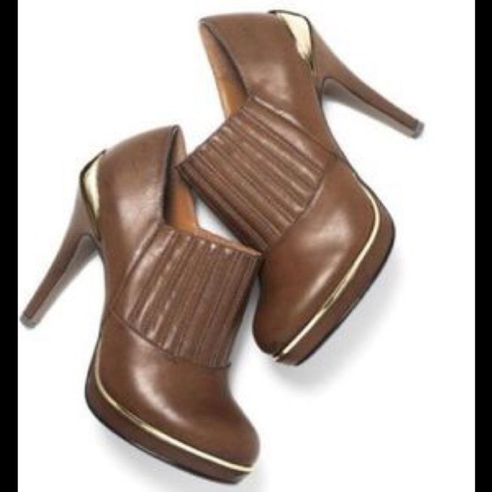 NWOB mark. Tough Luxe Booties